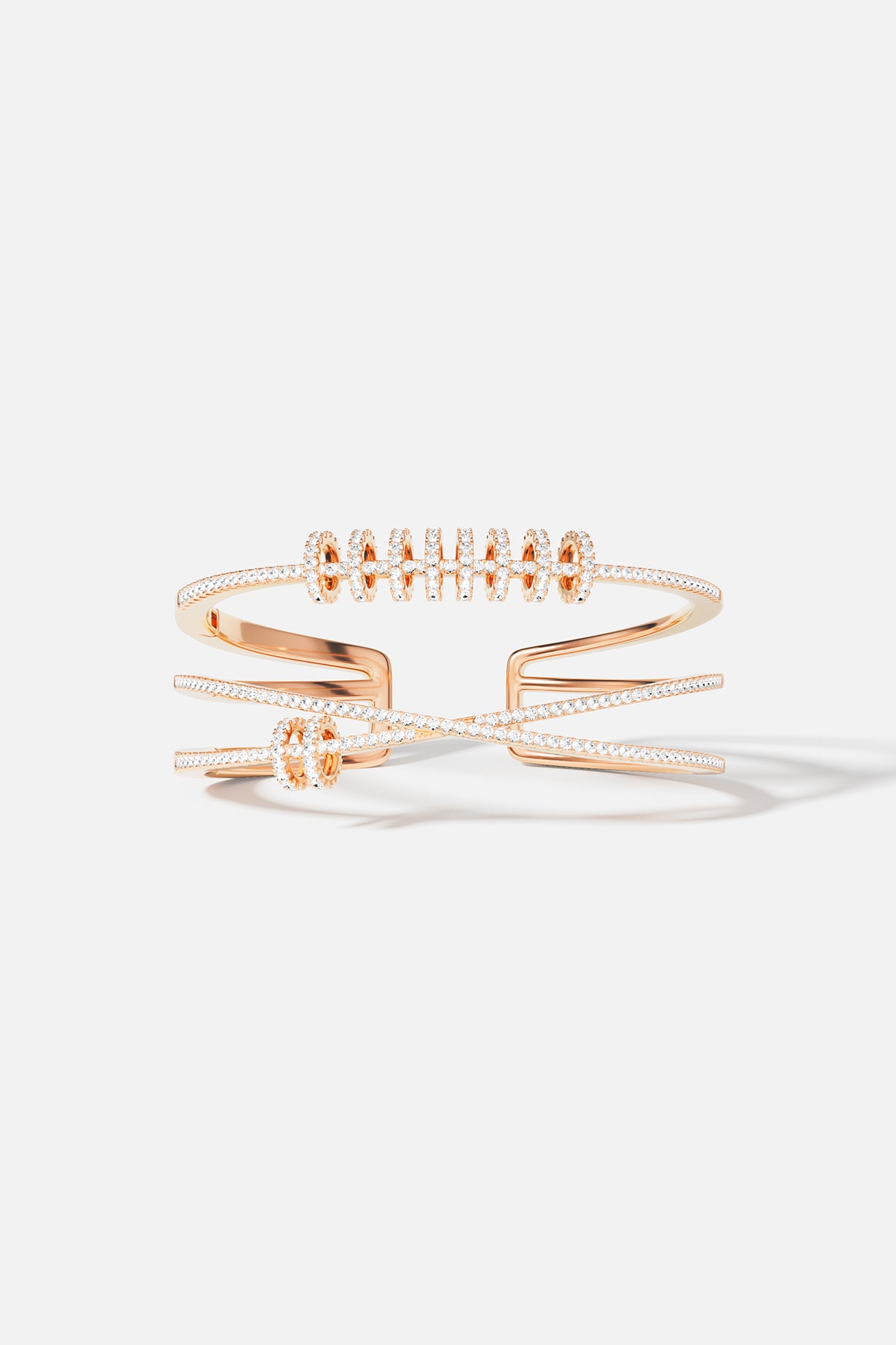 APM Monaco bracelet in rose color, sculptural lines with a modern, playful shine.