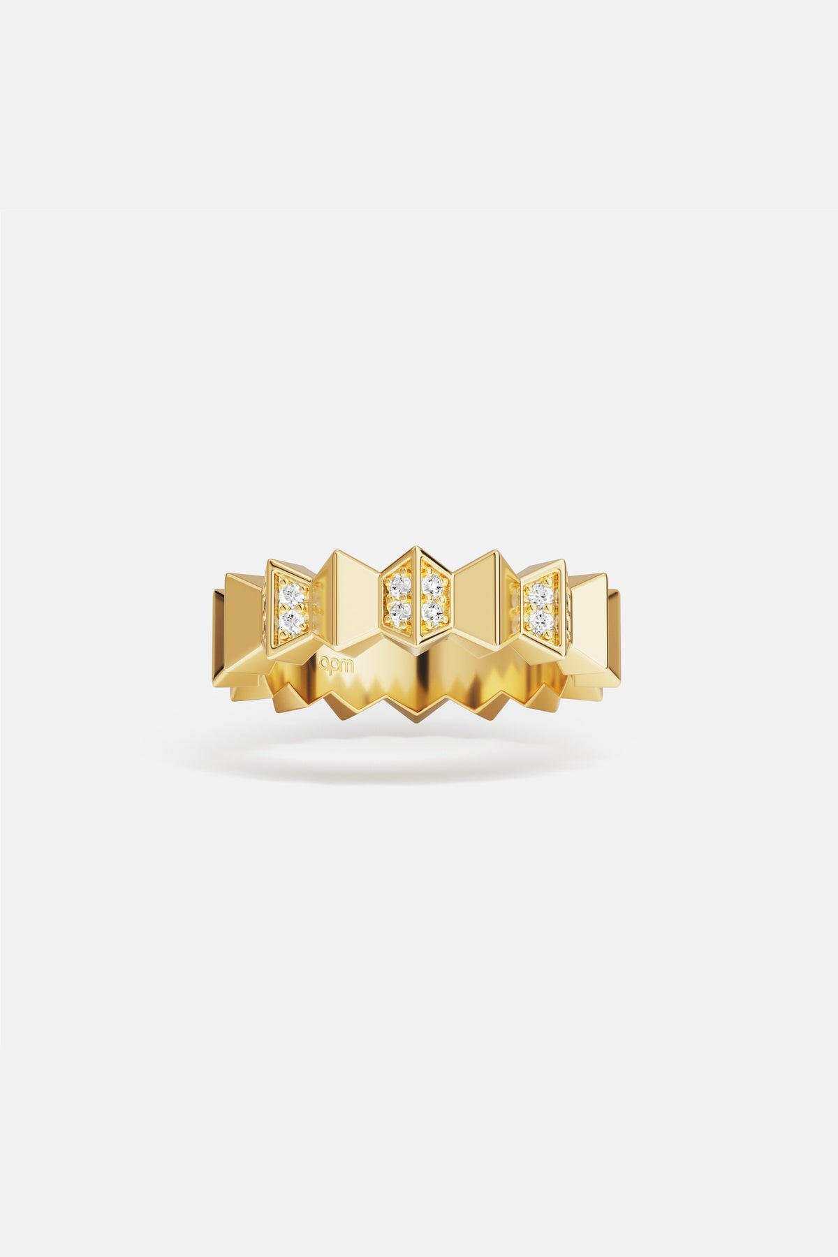 APM Ring in golden color, bold geometric edges with a radiant modern spirit.