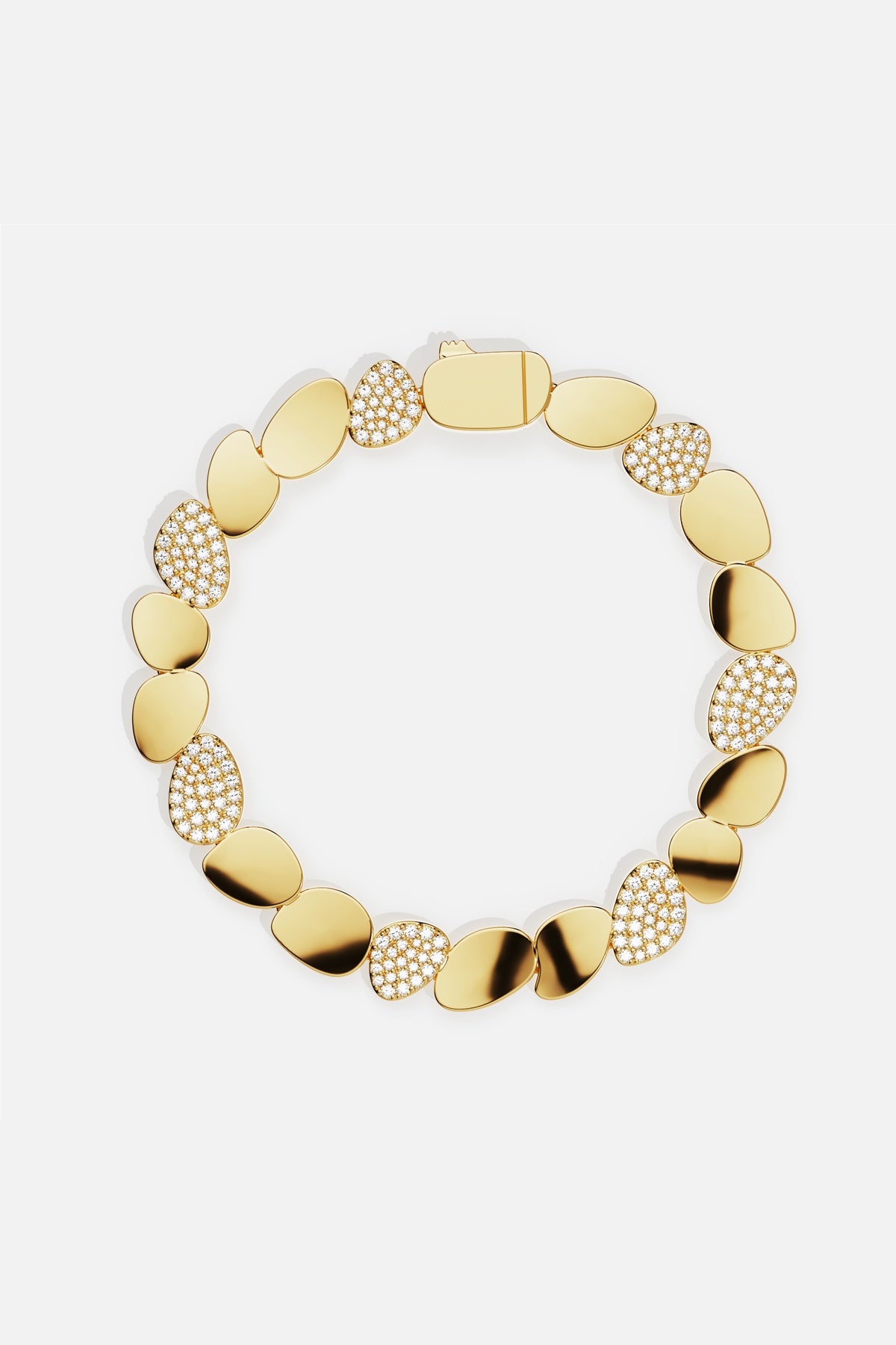 APM Monaco bracelet in golden pebbles, a fluid shimmer of modern elegance.