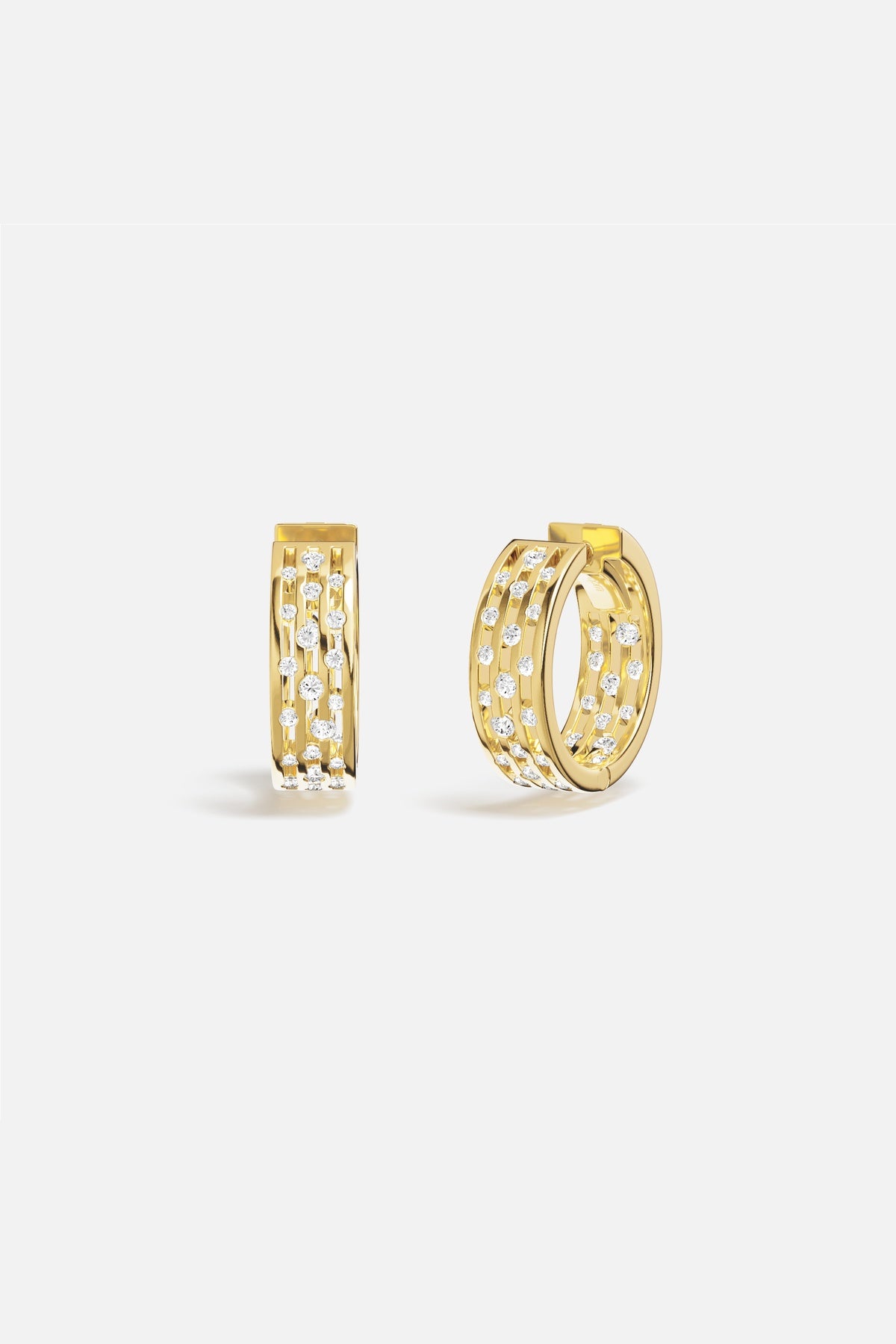 APM Hoop Earrings, golden radiance sprinkled with scattered sparkle, effortlessly chic.