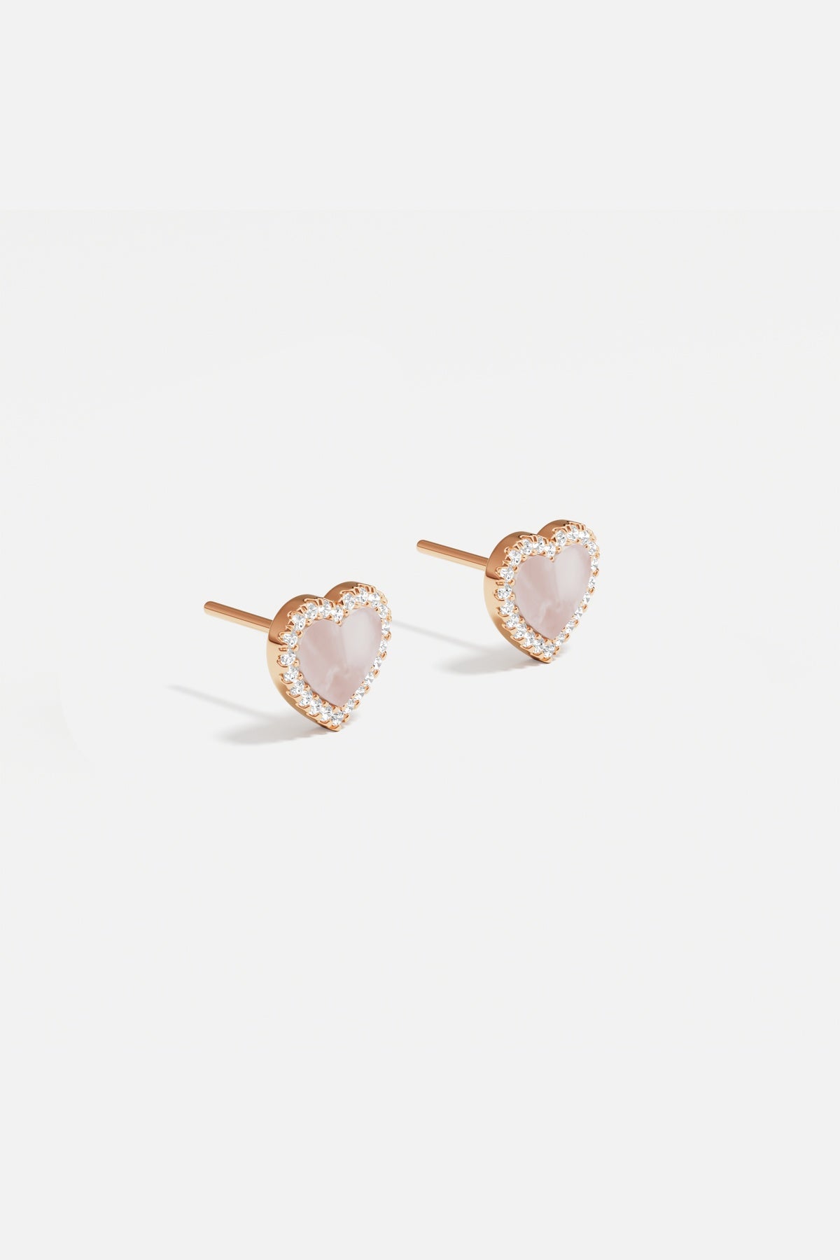 APM Heart Earrings, a tender blush glow wrapped in sparkling romance.
