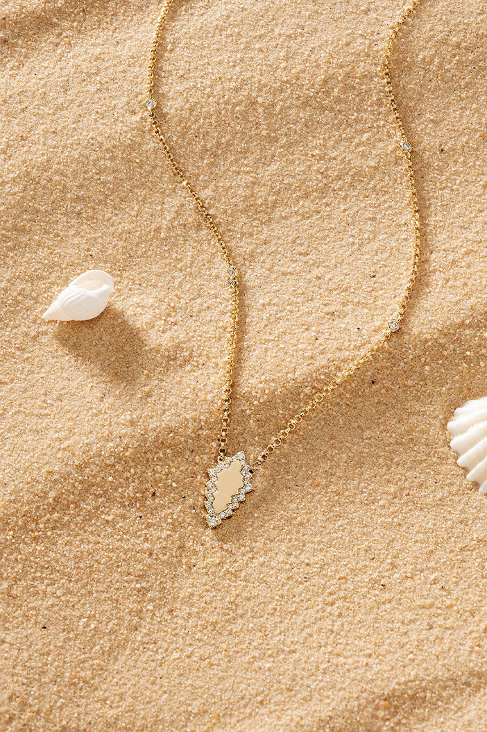 Necklaces APM Monaco yellow gold chain with a pavé diamond-encrusted pendant.