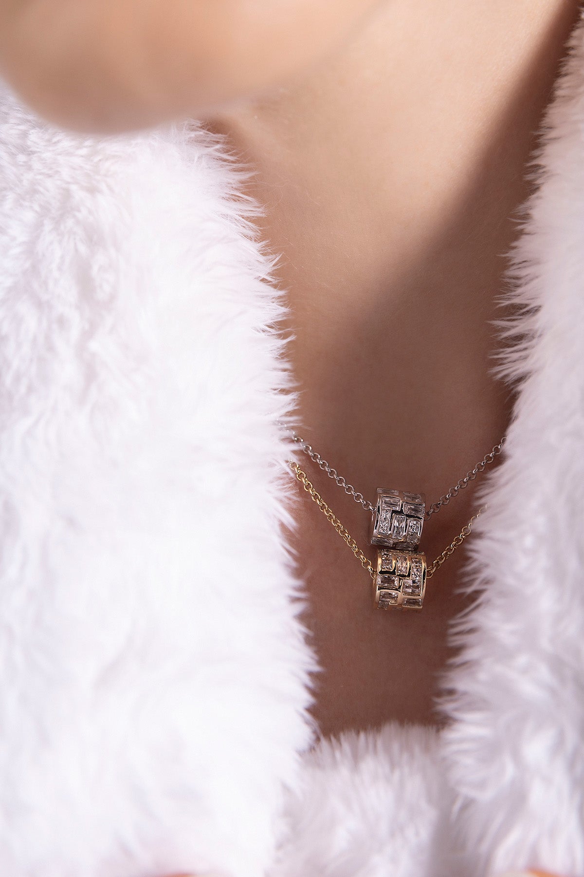 APM MONACO labyrinth adjustable choker on a white fur background