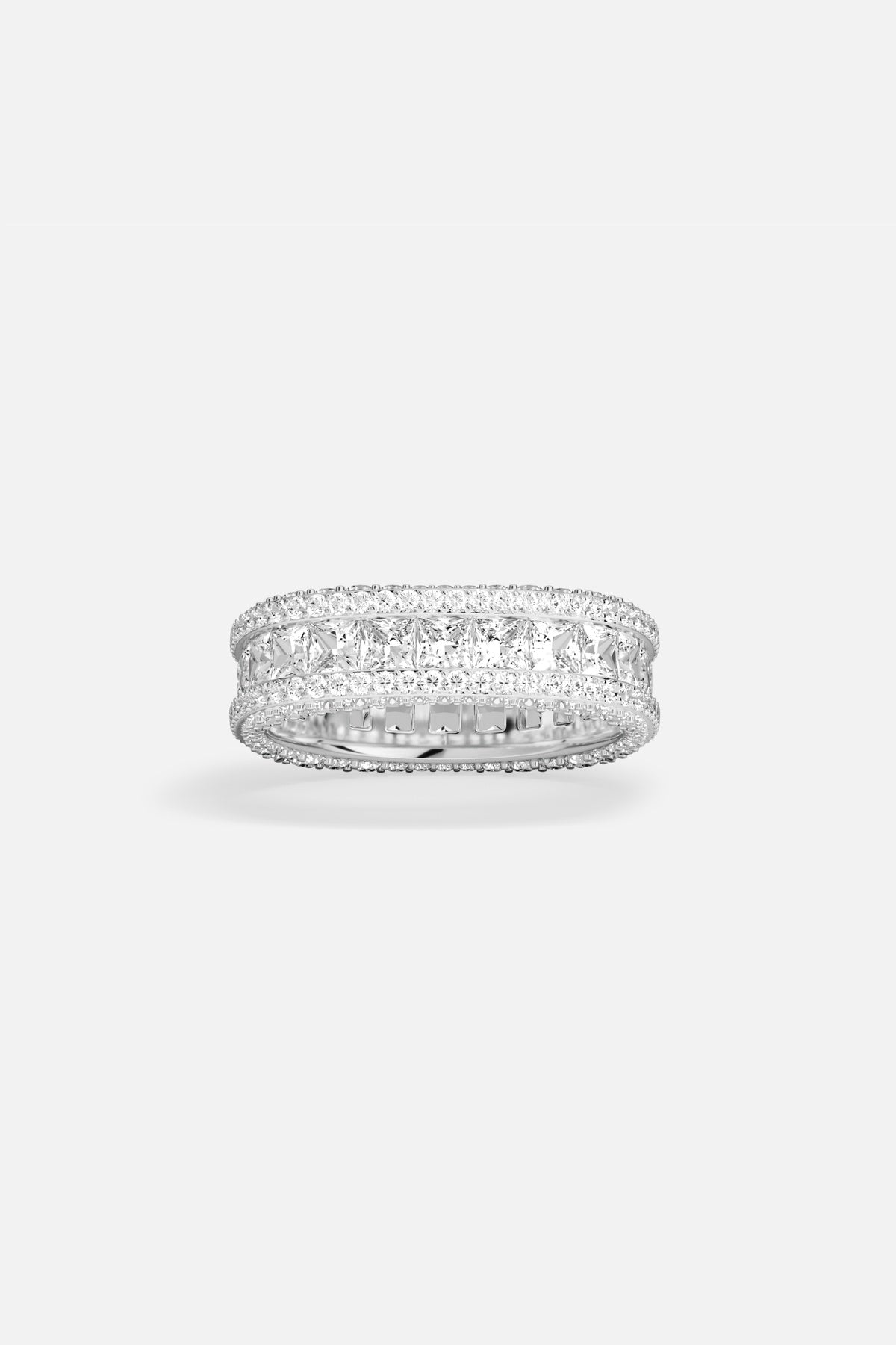 APM Ring, radiant brilliance in a rhodium finish, effortlessly timeless.