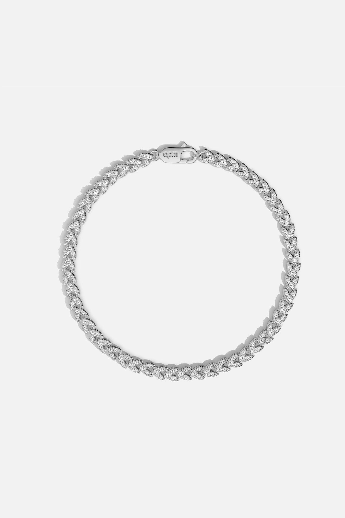 APM curb chain bracelet, shimmering links with a rhodium finish, effortlessly bold.