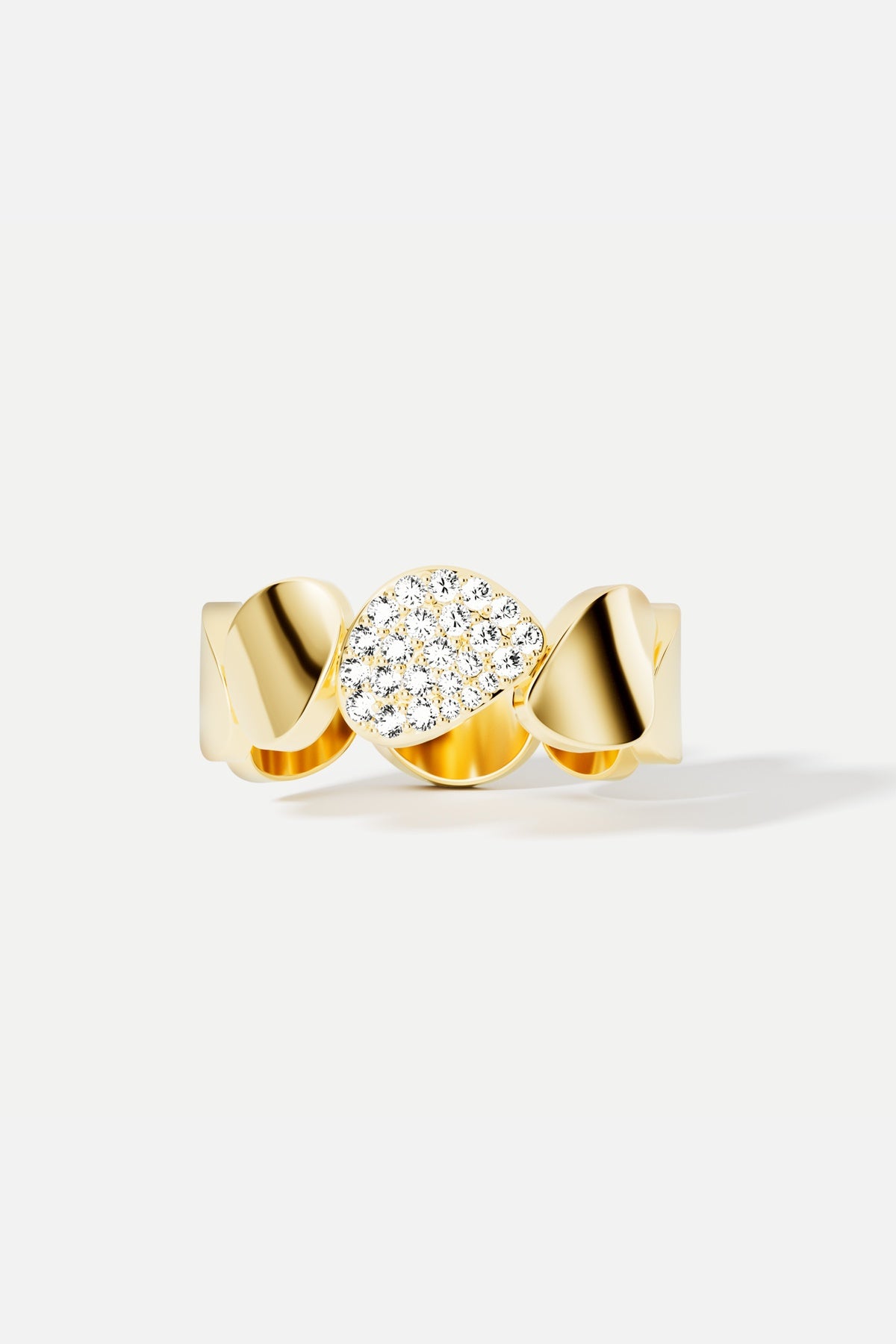 APM Ring in gold color, a fluid gesture of quiet radiance and modern grace.