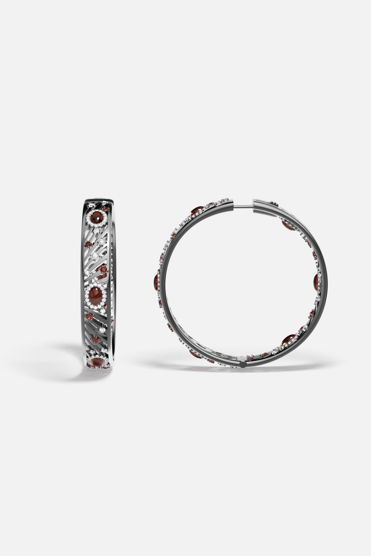 APM Hoop Earrings in rhodium finish, deep red stones glowing with bold elegance.