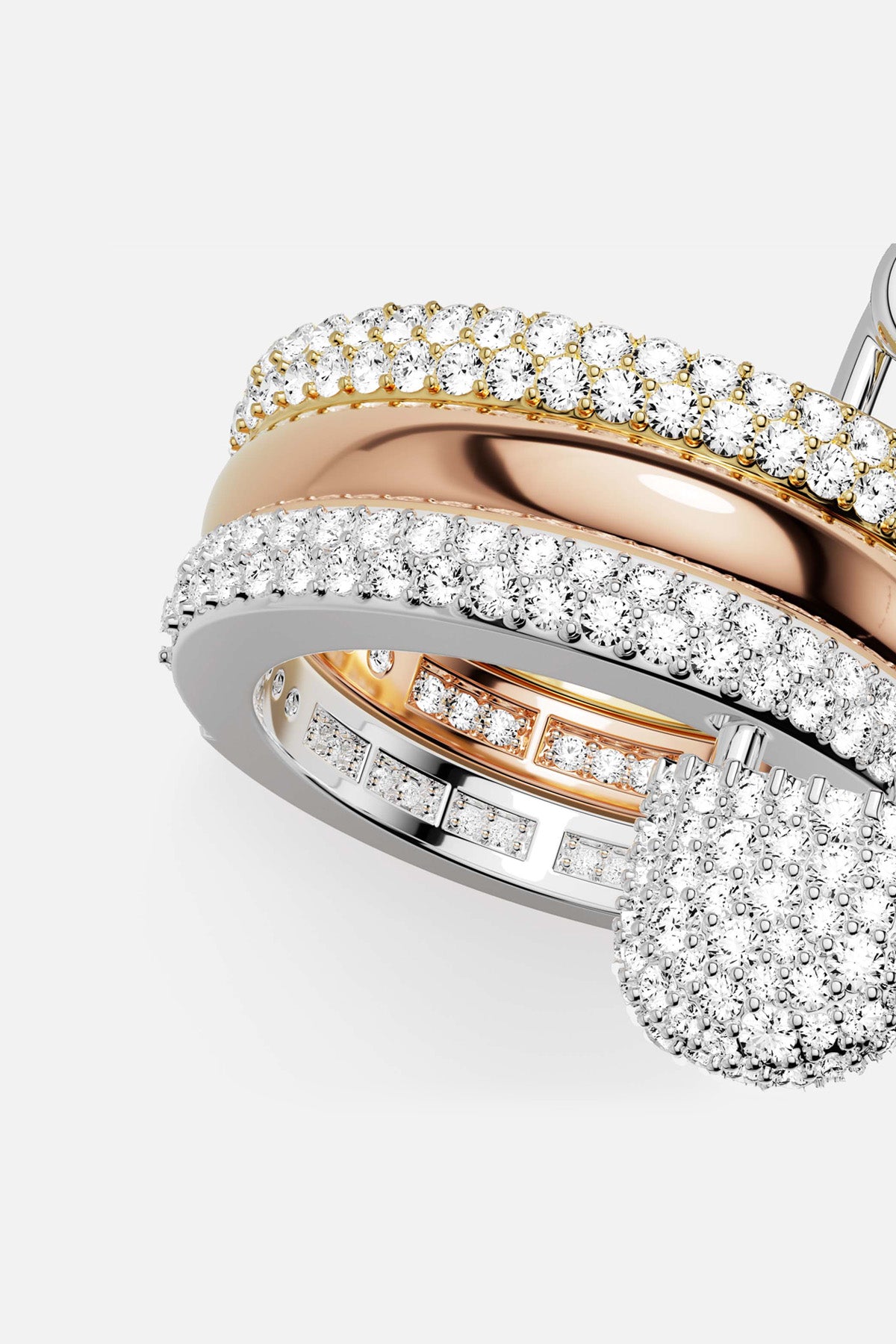 APM Ring, three shimmering colors intertwined in radiant pavé brilliance.