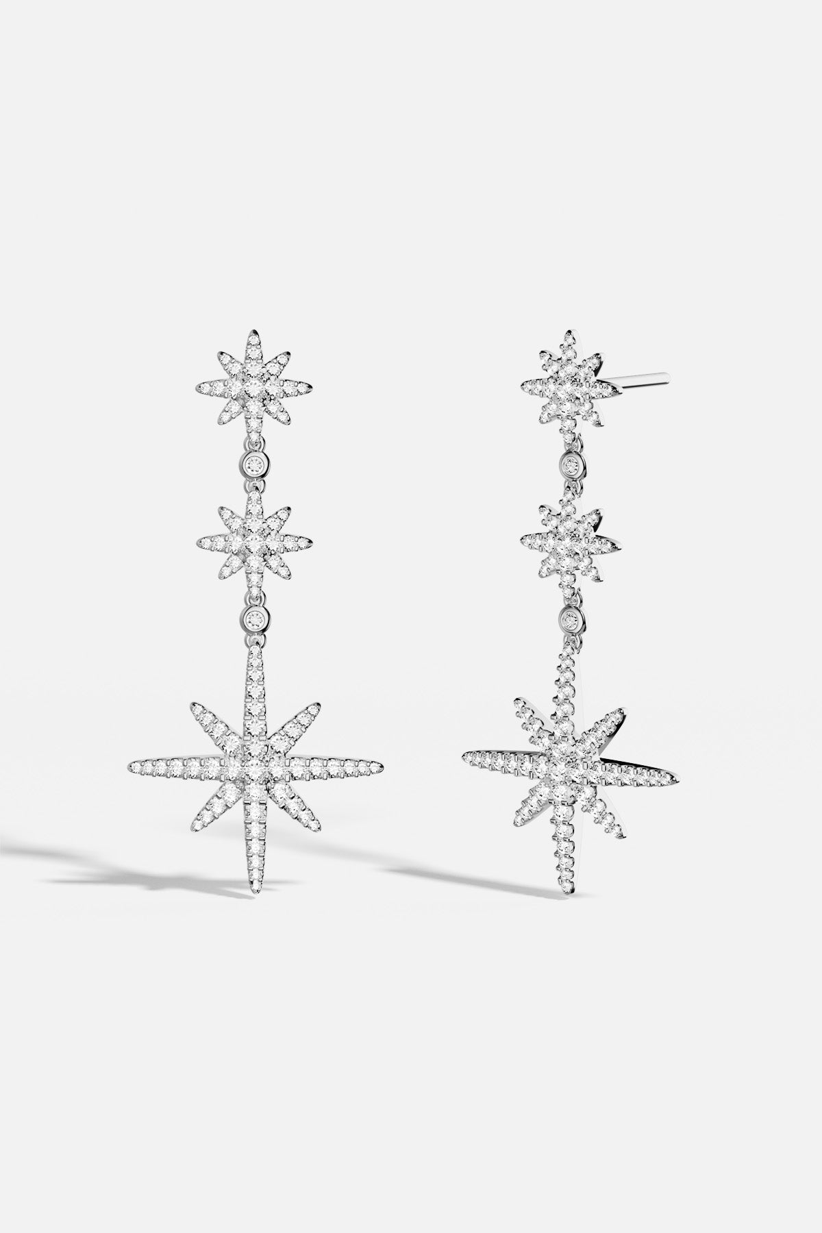 APM Météorites Earrings, a cascade of stars shimmering with celestial grace.