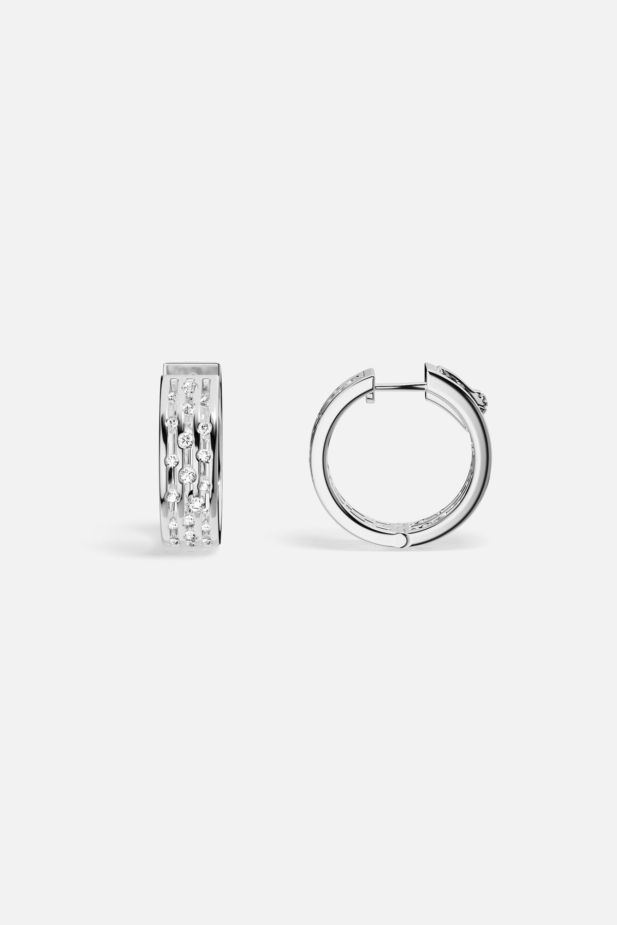 APM Hoop Earrings in rhodium finish, a radiant everyday statement.