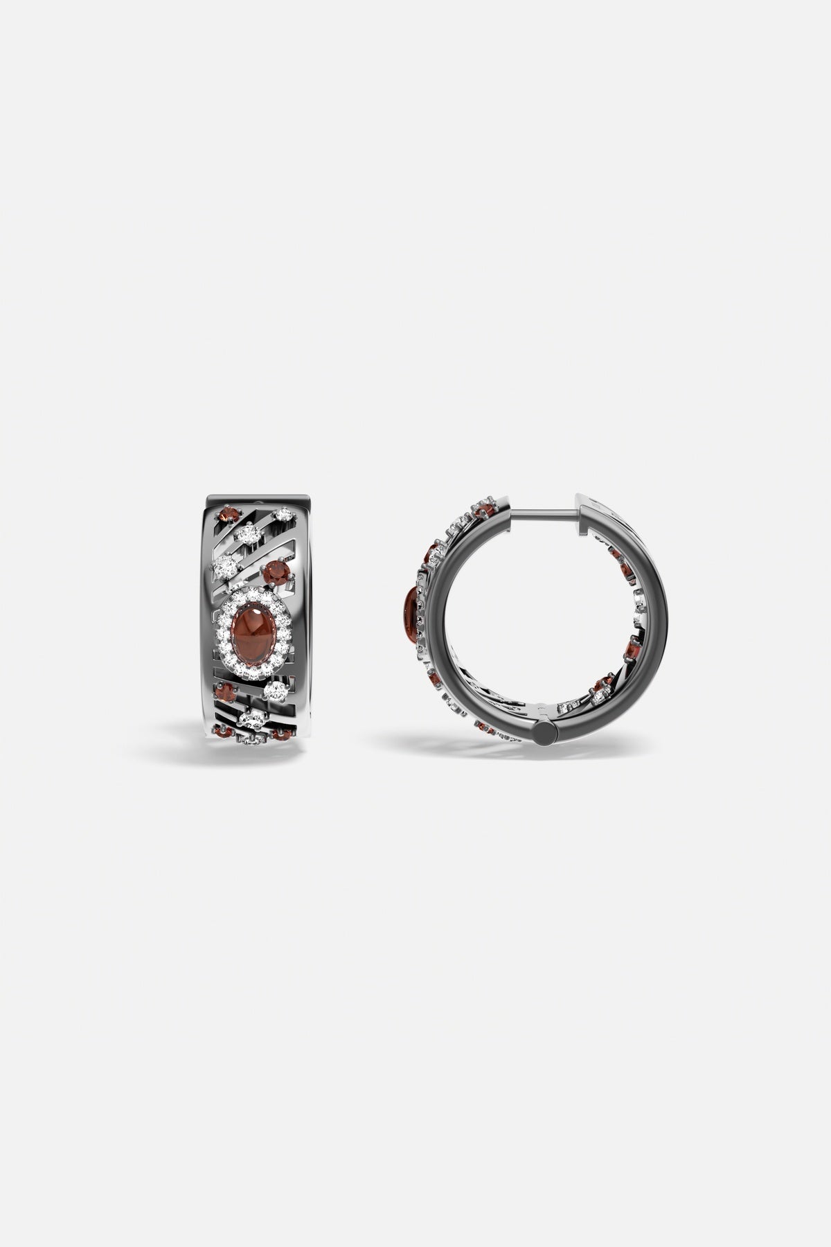 APM Hoop Earrings in rhodium finish, glowing with deep red and crystal accents.