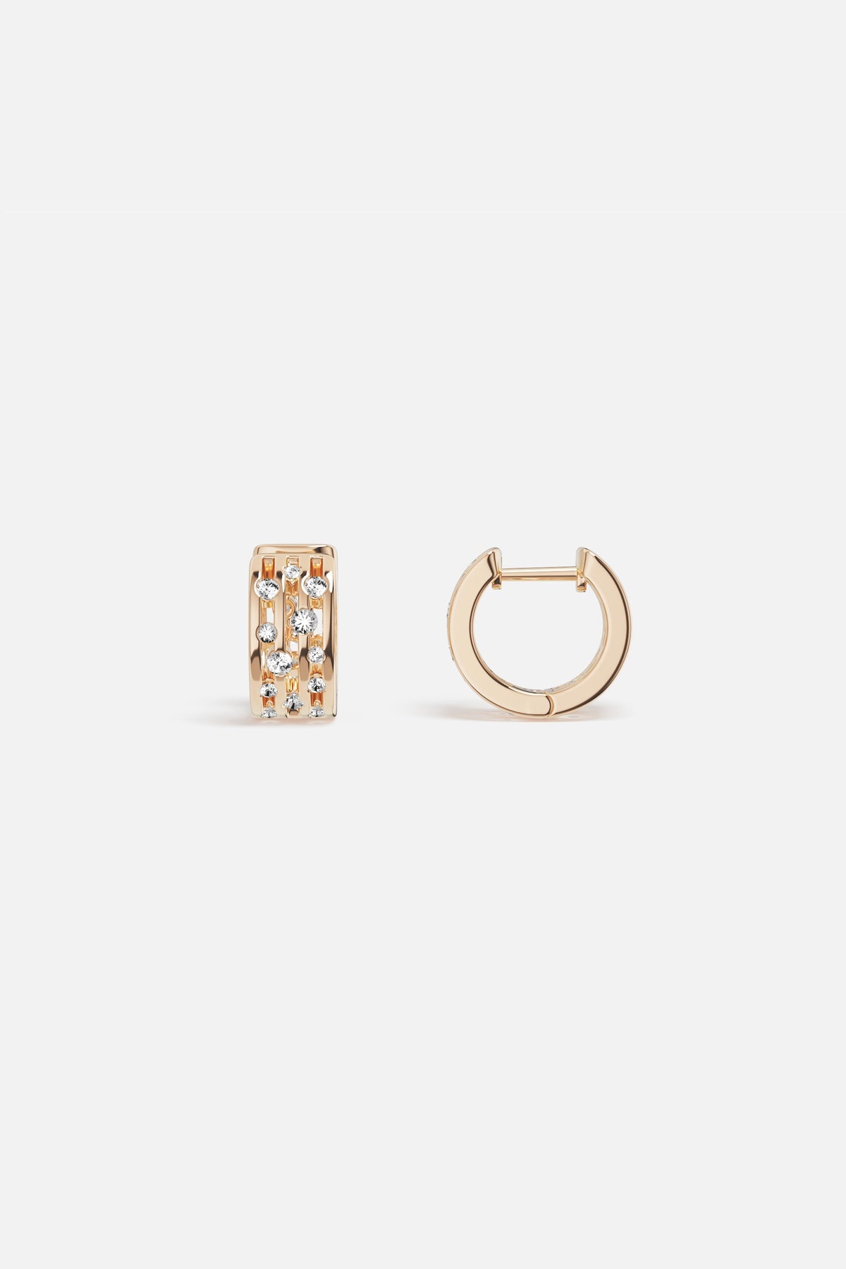 APM Hoop Earrings in warm gold color, sparkling with quiet confidence.