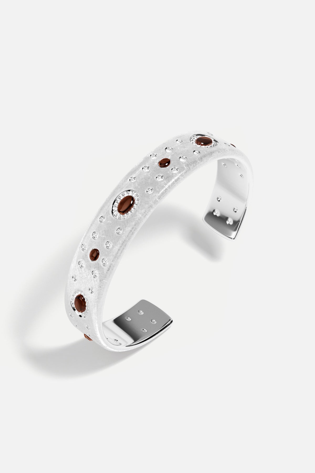 APM Cuff Bracelet, brushed rhodium finish scattered with warm amber constellations.