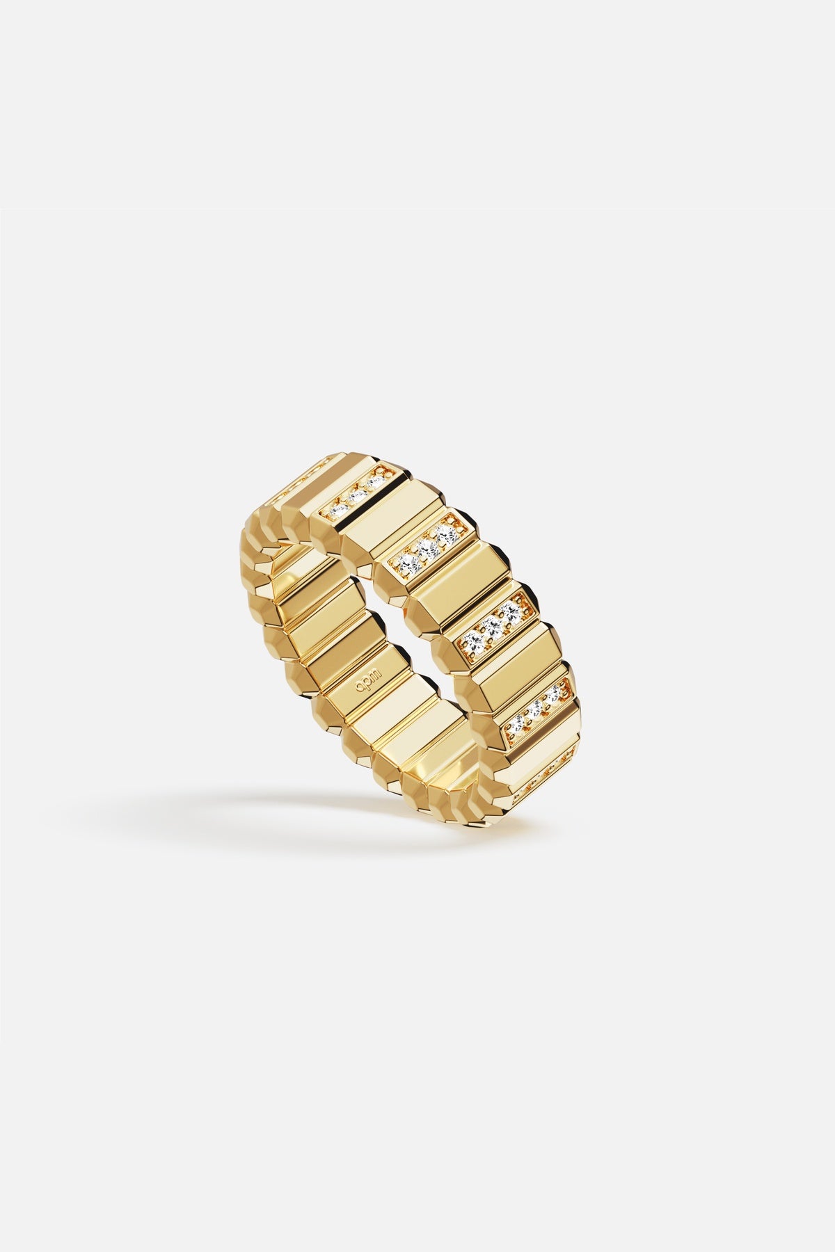 APM Ring in golden color, sculpted brilliance with a modern architectural edge.
