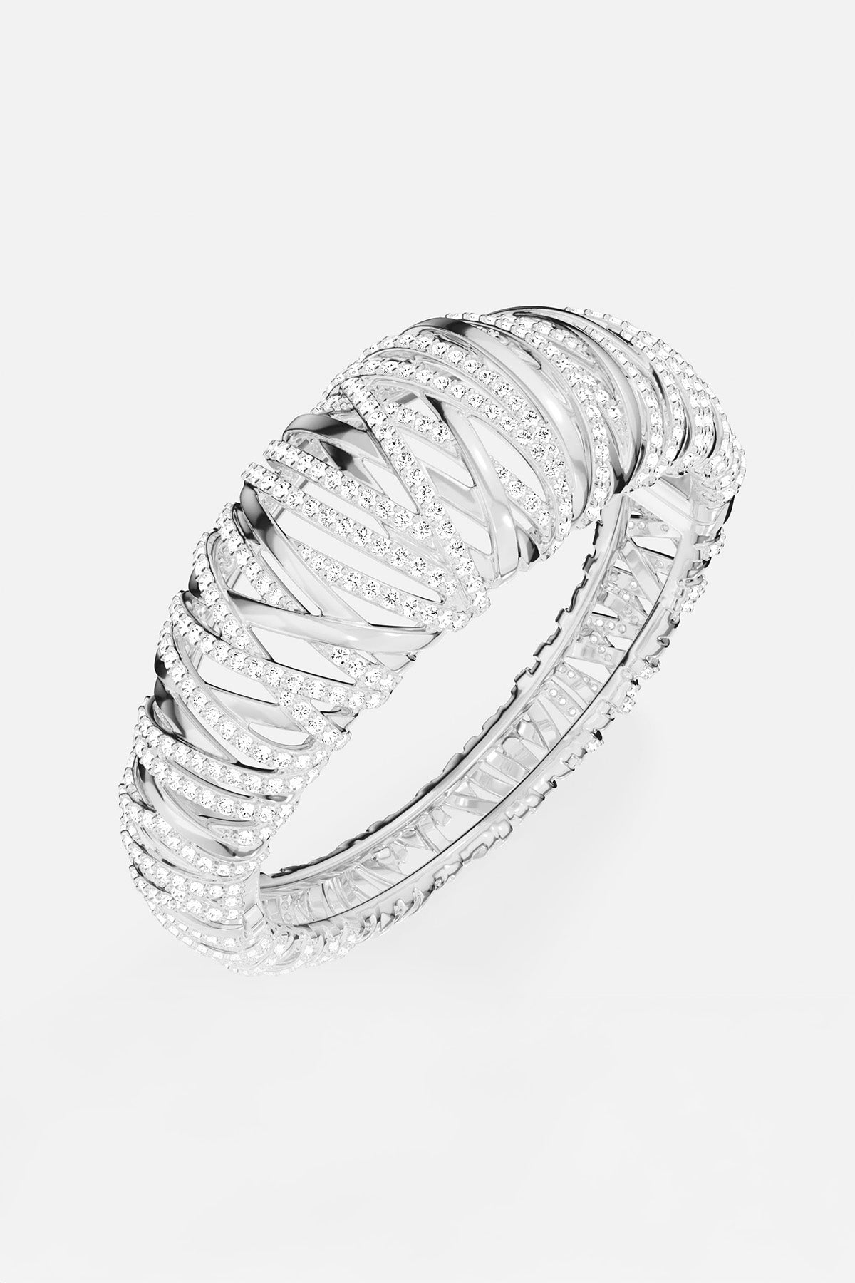 APM MONACO enlace bracelet in silver with clear white stones on a white background