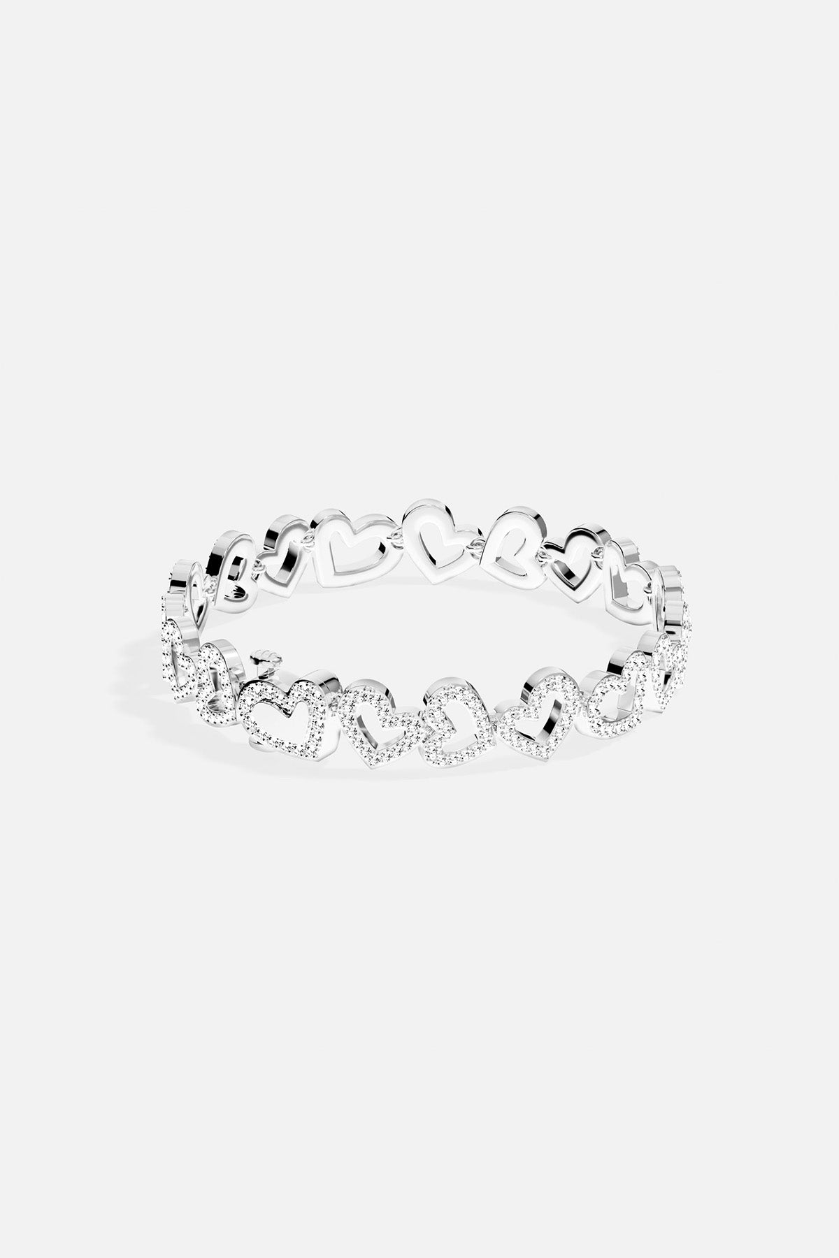 APM MONACO silver ring with heart-shaped design on a white background