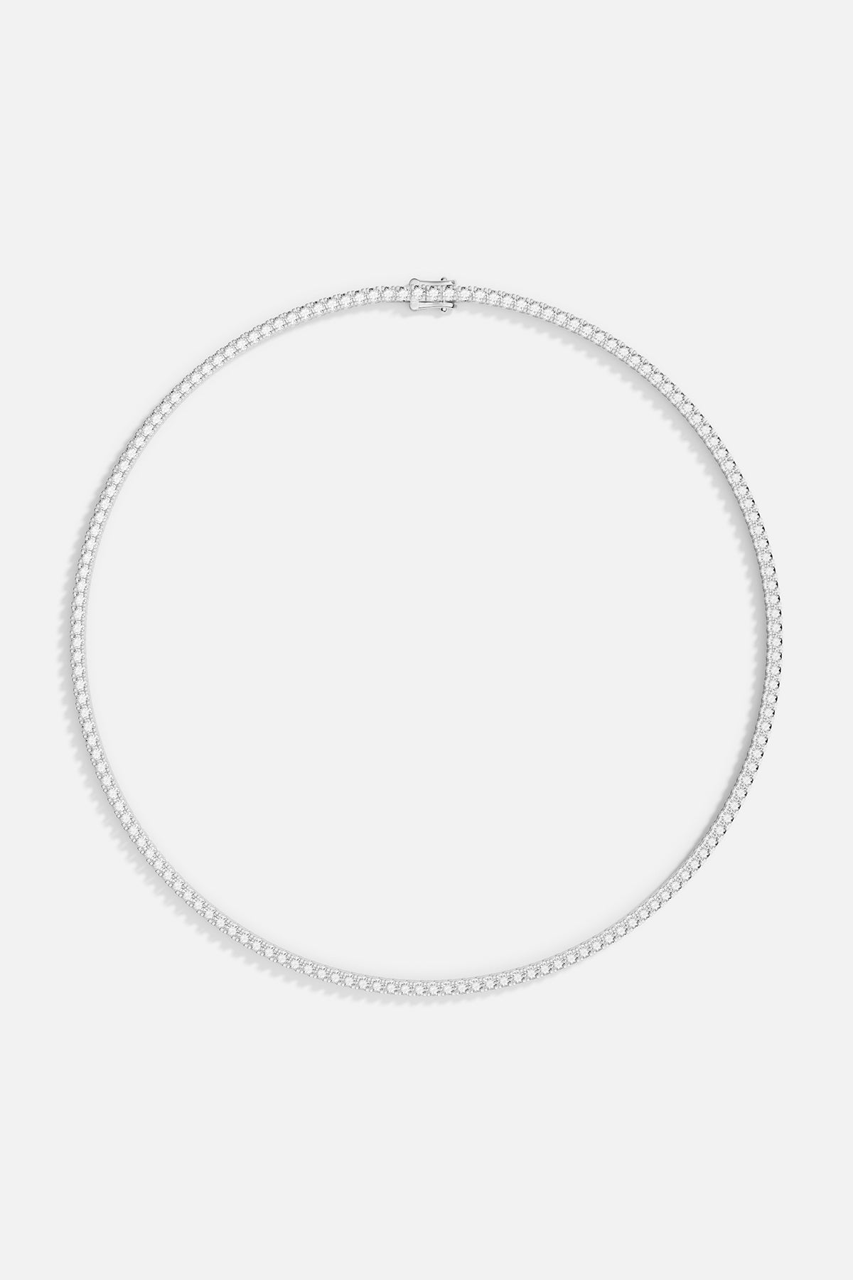 Necklaces APM Monaco pave choker with white stones on a silver-tone chain.