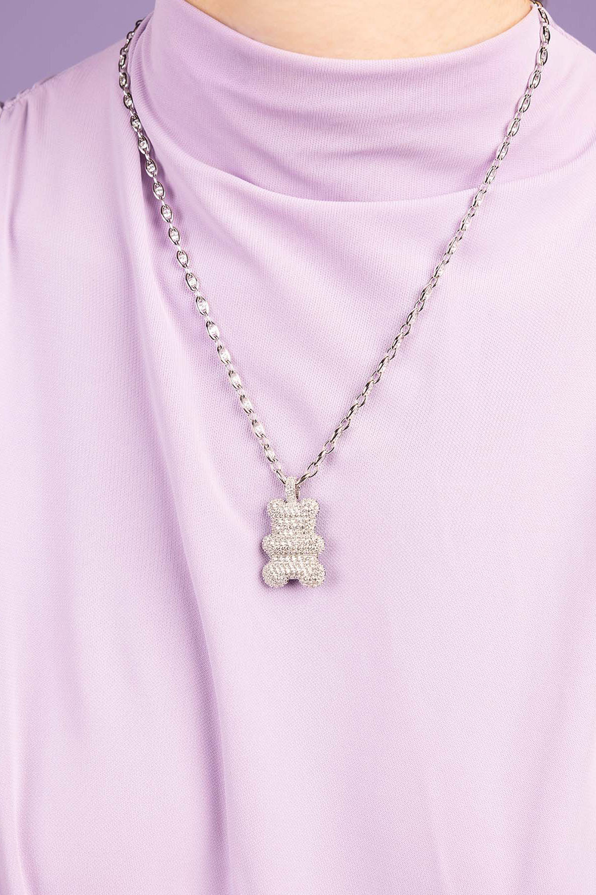 APM Monaco XL Baba Yummy Bear Adjustable Necklace worn on model with lilac background