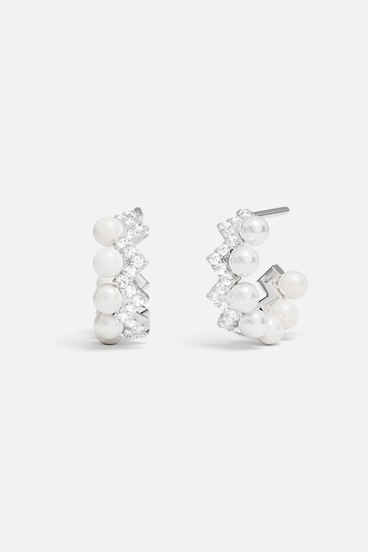 Earrings APM Monaco: pair of hoop earrings with white pearls and diamonds.