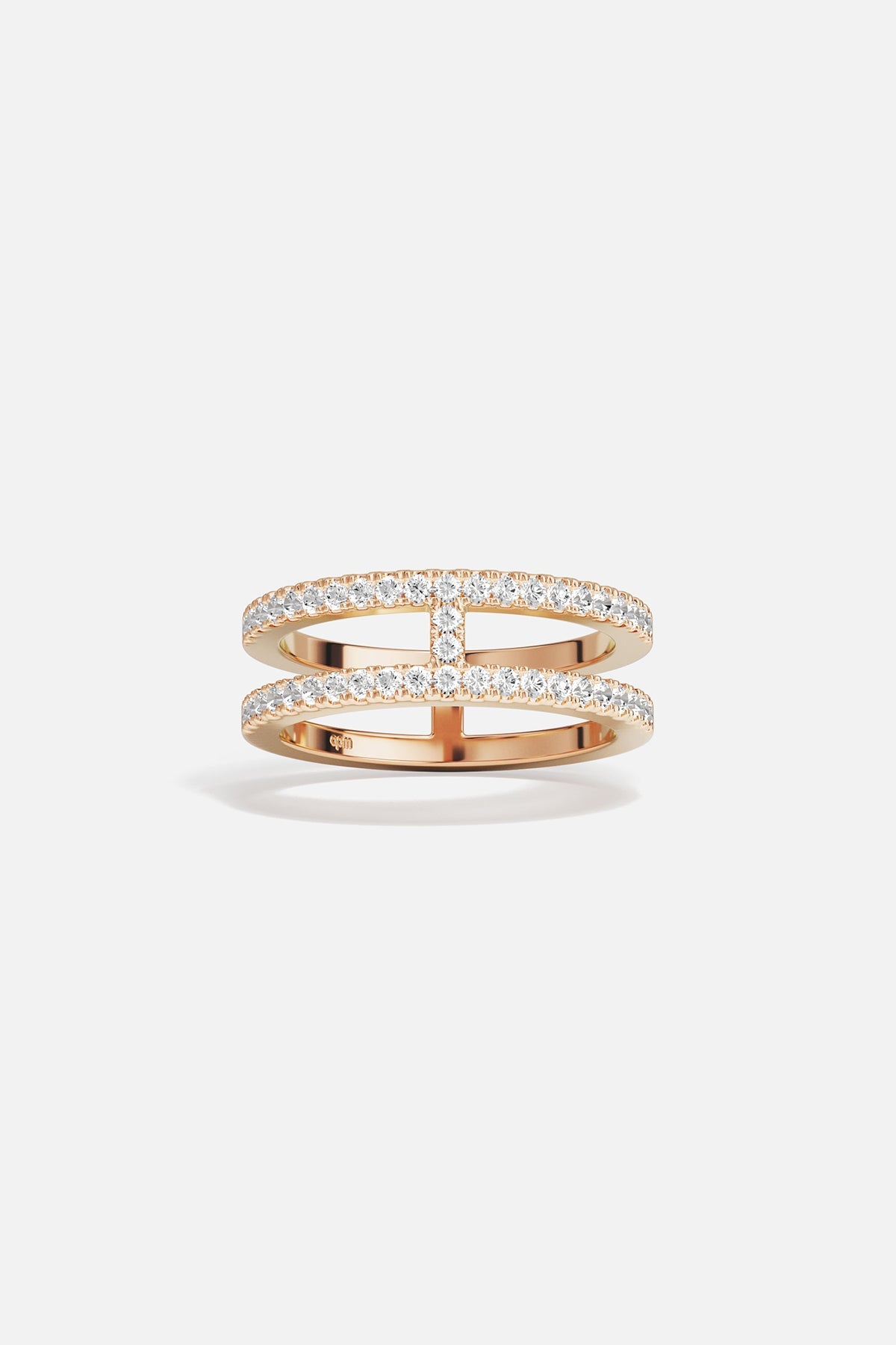 APM MONACO double line paved rose gold ring on a white background