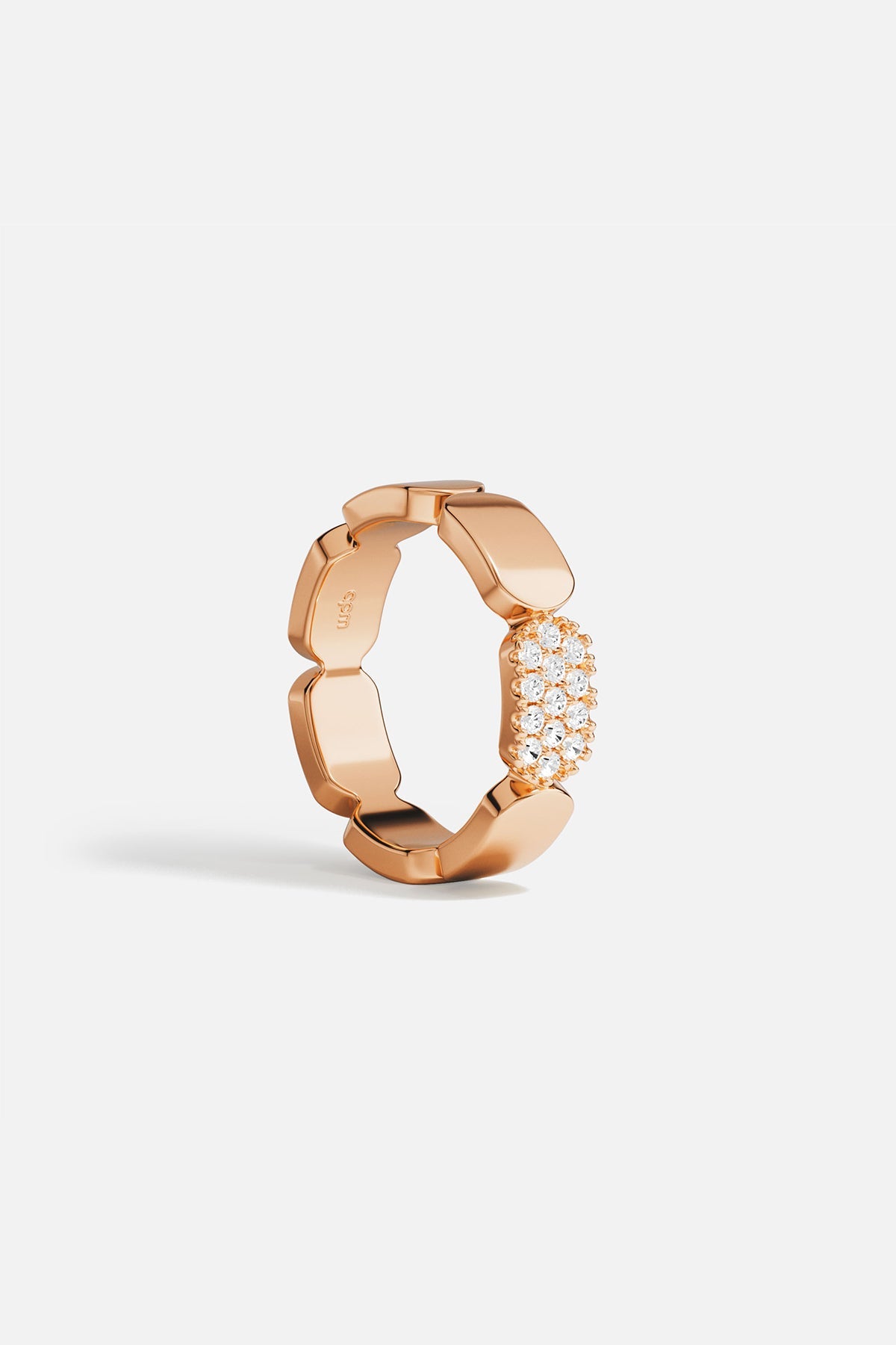 Rings APM Monaco dainty rose gold ring with small stones.