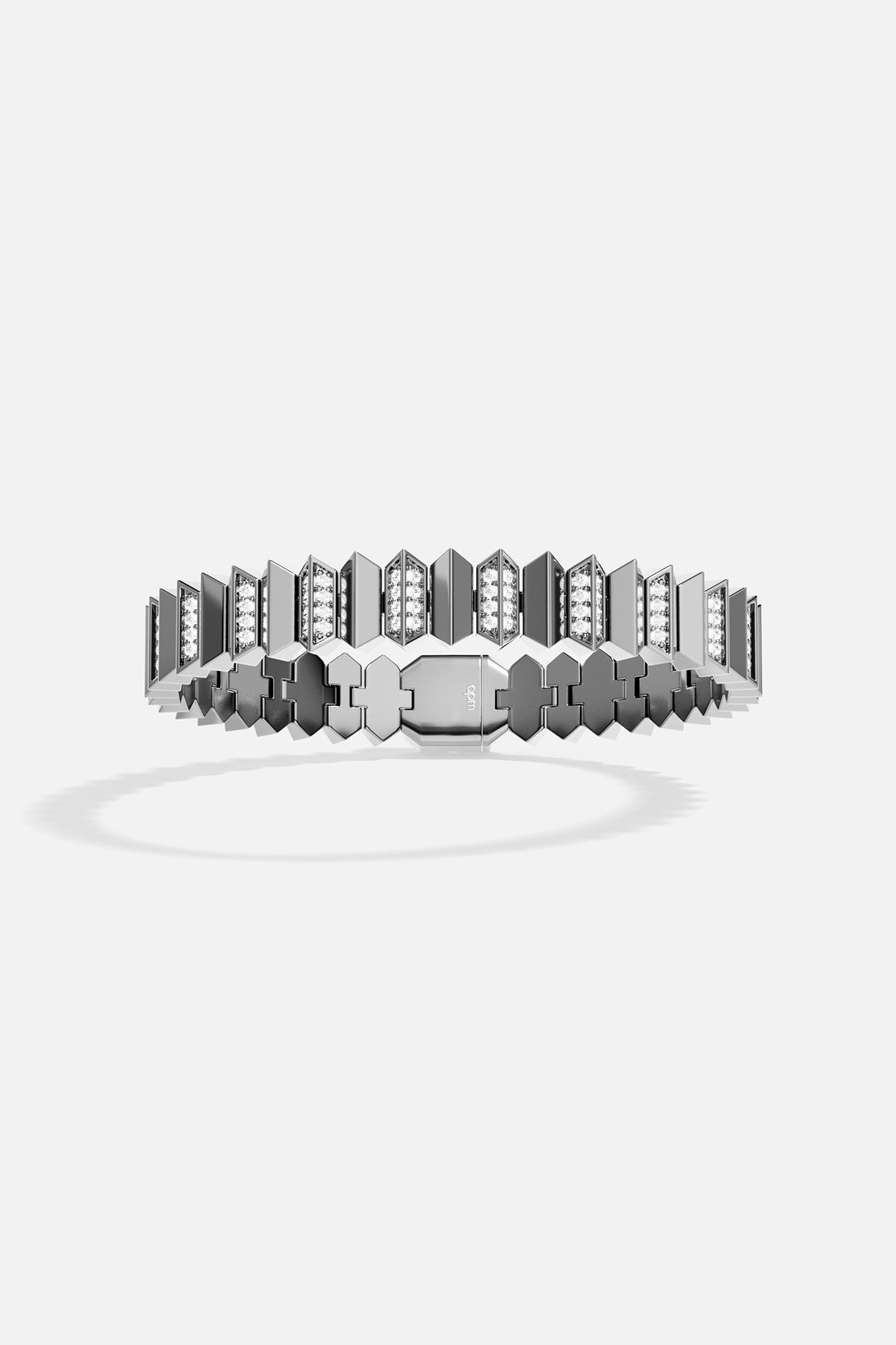 grey tone bracelet with geometric design on a white background