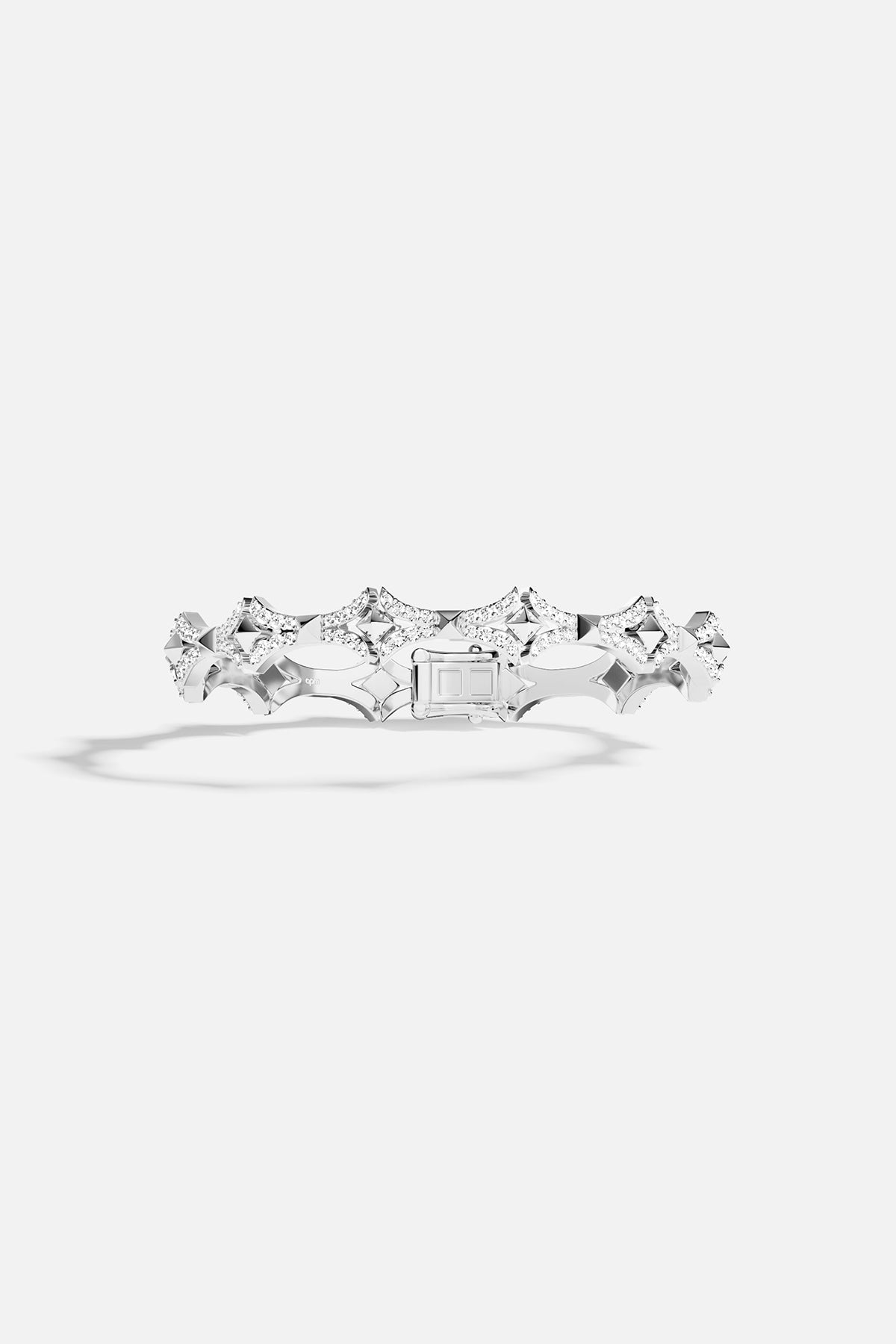 Silver tone bracelet on a white background
