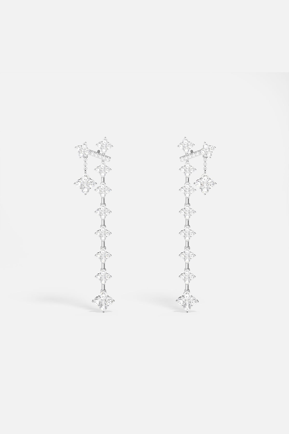 Earrings APM Monaco: silver-tone drop earrings with pavé cubic zirconia.