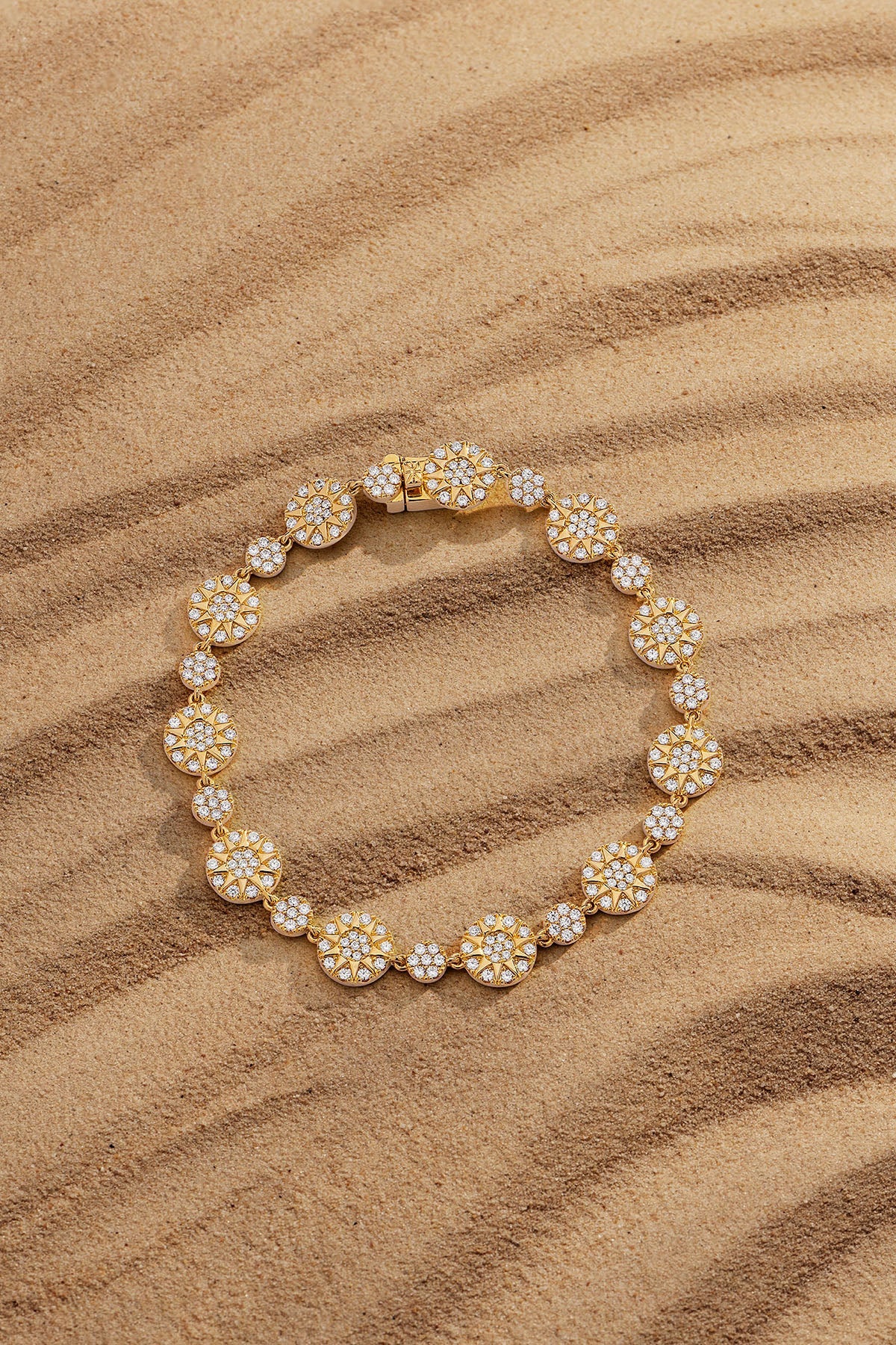 Bracelet APM Monaco, yellow gold with pavé diamonds.