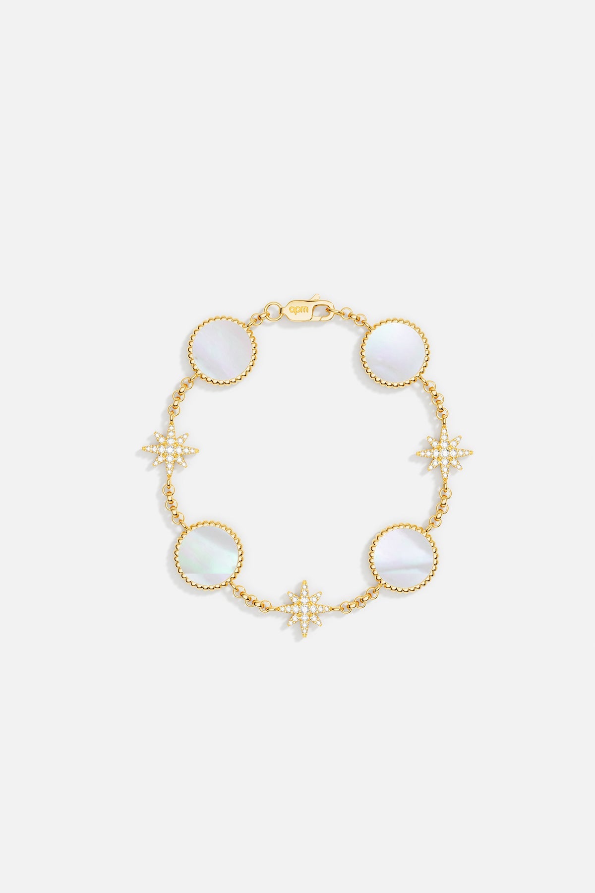 Bracelets APM Monaco: Yellow gold bracelet featuring alternating round nacre medallions and star-shaped diamond stations on a slender chain.